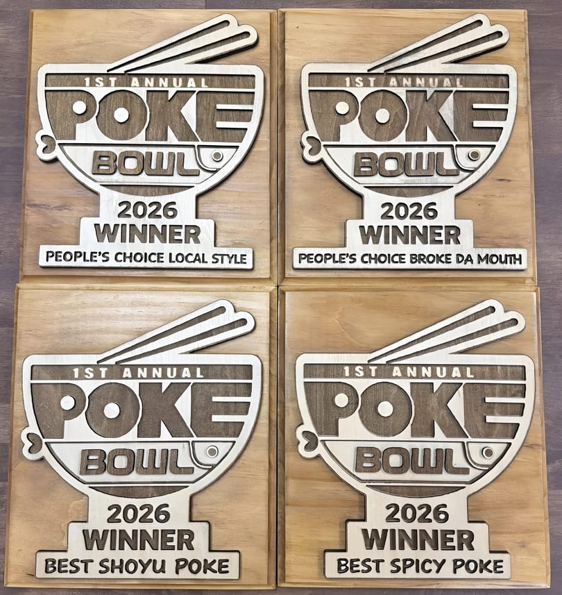Four wooden plaques for the 1st Annual Poke Bowl 2026, celebrating different poke winners.
